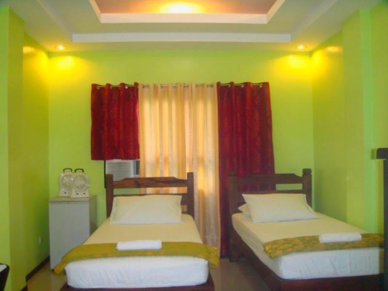 Lawaan Garden Inn Рохас Экстерьер фото