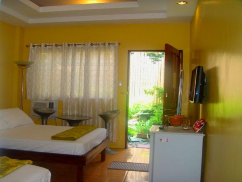 Lawaan Garden Inn Рохас Экстерьер фото